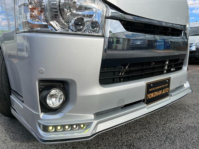 ハイエースバン ロングスーパーGL 4型 ディーゼル バッドフェイス 2インチローダウン 15インチアルミホイール Fスポイラー LEDライト&フォグ LEDテール シートカバー 前後センサー 純正ナビ Bカメラ ETC(34枚目)