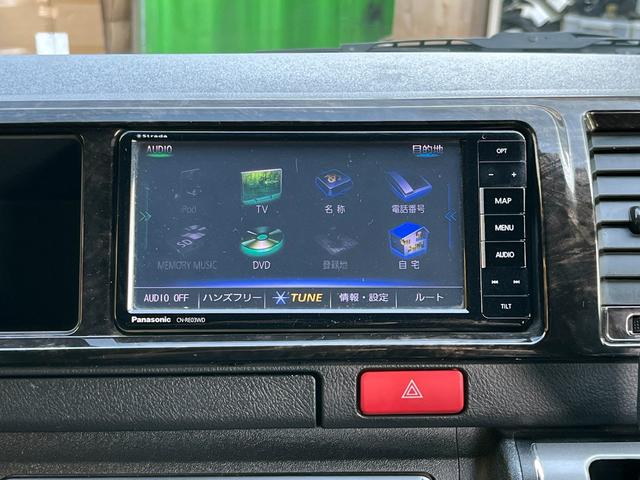 ハイエースバン スーパーGL ダークプライムII 5型ディーゼル グラインドタトゥー施工 ローダウン 20インチアルミホイール 社外ナビ ETC モデリスタスポイラー 電動スライドドア Rフィルム LED室内灯 トヨタセーフティセンス スマートキー(24枚目)