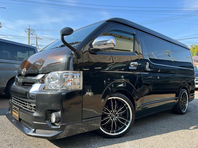 ハイエースバン スーパーGL ダークプライムII 5型ディーゼル グラインドタトゥー施工 ローダウン 20インチアルミホイール 社外ナビ ETC モデリスタスポイラー 電動スライドドア Rフィルム LED室内灯 トヨタセーフティセンス スマートキー(28枚目)