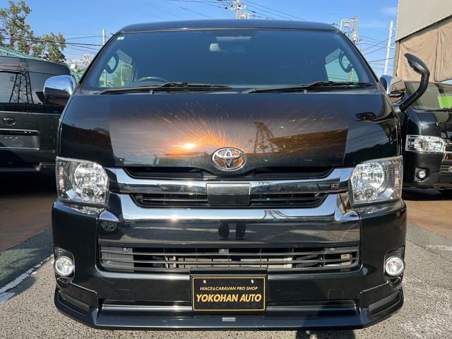 ハイエースバン スーパーGL ダークプライムII 5型ディーゼル グラインドタトゥー施工 ローダウン 20インチアルミホイール 社外ナビ ETC モデリスタスポイラー 電動スライドドア Rフィルム LED室内灯 トヨタセーフティセンス スマートキー(29枚目)