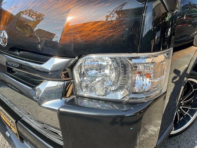 ハイエースバン スーパーGL ダークプライムII 5型ディーゼル グラインドタトゥー施工 ローダウン 20インチアルミホイール 社外ナビ ETC モデリスタスポイラー 電動スライドドア Rフィルム LED室内灯 トヨタセーフティセンス スマートキー(31枚目)