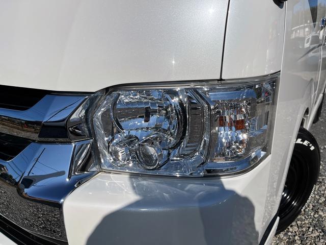 ハイエースワゴン ＧＬ　５型　ワンオーナー　社外ナビＴＶ　電動スライドドア　フローリング加工　ローダウン　４列目ベッドキット　モデリスタエアロ　シートカバー　リアフィルム　後席モニター　バックカメラ　ＥＴＣ（36枚目）