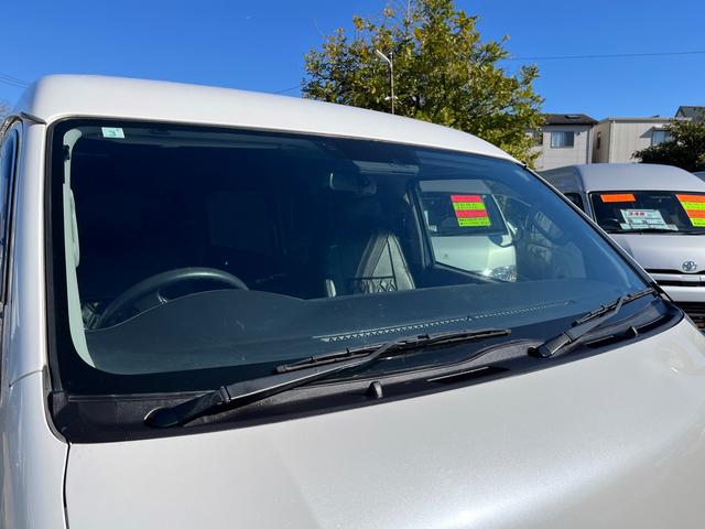 ハイエースワゴン ＧＬ　５型　ワンオーナー　社外ナビＴＶ　電動スライドドア　フローリング加工　ローダウン　４列目ベッドキット　モデリスタエアロ　シートカバー　リアフィルム　後席モニター　バックカメラ　ＥＴＣ（38枚目）