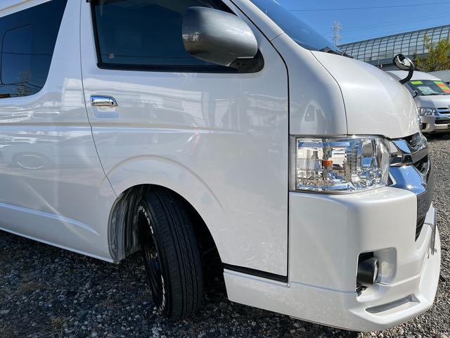 ハイエースワゴン ＧＬ　５型　ワンオーナー　社外ナビＴＶ　電動スライドドア　フローリング加工　ローダウン　４列目ベッドキット　モデリスタエアロ　シートカバー　リアフィルム　後席モニター　バックカメラ　ＥＴＣ（45枚目）