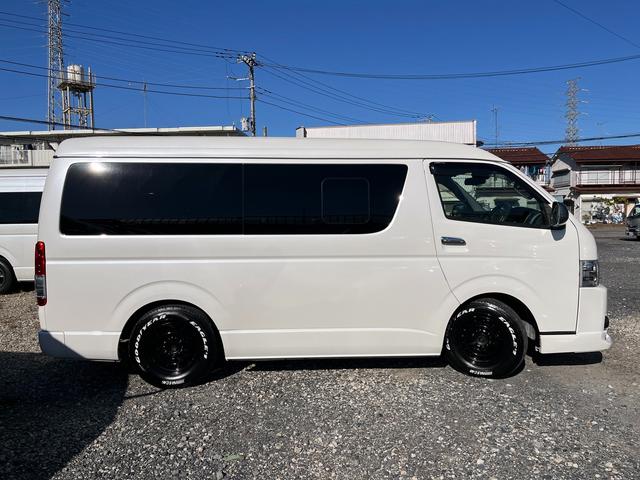 ハイエースワゴン ＧＬ　５型　ワンオーナー　社外ナビＴＶ　電動スライドドア　フローリング加工　ローダウン　４列目ベッドキット　モデリスタエアロ　シートカバー　リアフィルム　後席モニター　バックカメラ　ＥＴＣ（46枚目）