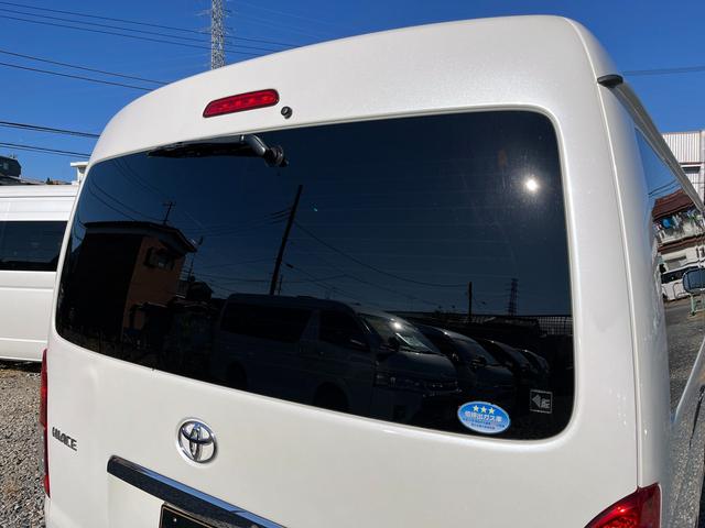 ハイエースワゴン ＧＬ　５型　ワンオーナー　社外ナビＴＶ　電動スライドドア　フローリング加工　ローダウン　４列目ベッドキット　モデリスタエアロ　シートカバー　リアフィルム　後席モニター　バックカメラ　ＥＴＣ（48枚目）