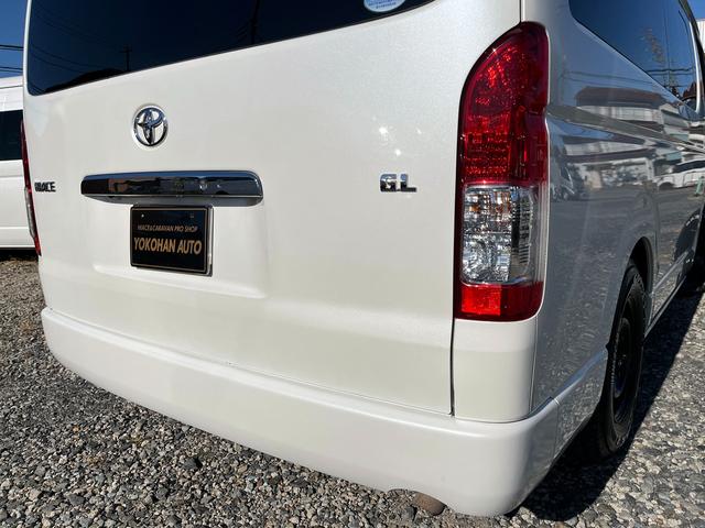 ハイエースワゴン ＧＬ　５型　ワンオーナー　社外ナビＴＶ　電動スライドドア　フローリング加工　ローダウン　４列目ベッドキット　モデリスタエアロ　シートカバー　リアフィルム　後席モニター　バックカメラ　ＥＴＣ（49枚目）