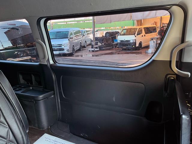 ハイエースワゴン ＧＬ　５型　ワンオーナー　社外ナビＴＶ　電動スライドドア　フローリング加工　ローダウン　４列目ベッドキット　モデリスタエアロ　シートカバー　リアフィルム　後席モニター　バックカメラ　ＥＴＣ（62枚目）