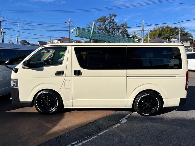 ハイエースバン ロングDX 4型 社外ナビ バックカメラ ETC ローダウン 新品16インチアルミホイール&タイヤ インナーブラックライト 電格ミラー スーパーGLセカンドシート シートカバー ドラレコ プライバシーガラス(6枚目)