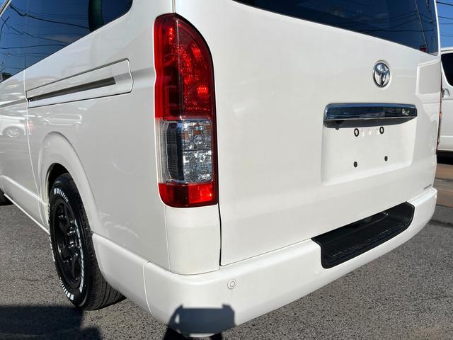 ハイエースバン ロングワイドスーパーGL 5型 2.8ディーゼル ワンオーナー 純正ナビ バックカメラ ETC2.0 ローダウン 16インチアルミ 新品PARADAタイヤ モデリスタエアロ LEDライト シートカバー 前後ソナー ドラレコ(50枚目)