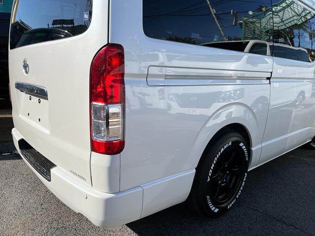 ハイエースバン ロングワイドスーパーGL 5型 2.8ディーゼル ワンオーナー 純正ナビ バックカメラ ETC2.0 ローダウン 16インチアルミ 新品PARADAタイヤ モデリスタエアロ LEDライト シートカバー 前後ソナー ドラレコ(52枚目)