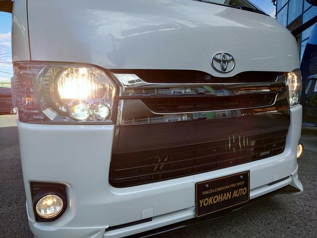 ハイエースバン スーパーGL ダークプライム 4型 3.0ディーゼルターボ 2インチローダウン 17インチアルミホイール フロントエアロ スライド窓 イージークローザー 木目調パネル 純正ナビフルセグTV バックカメラ ETC タイベル交換済み(15枚目)