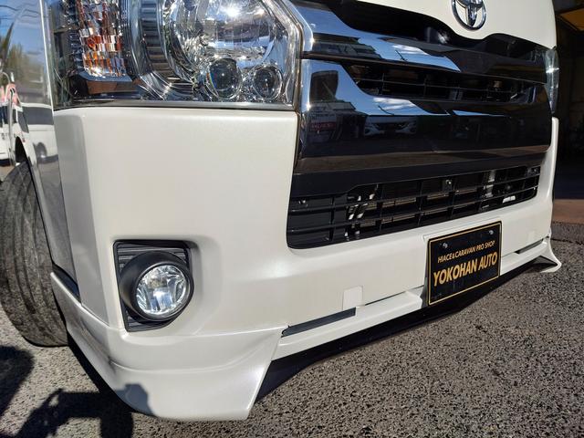 ハイエースバン スーパーGL ダークプライム 4型 3.0ディーゼルターボ 2インチローダウン 17インチアルミホイール フロントエアロ スライド窓 イージークローザー 木目調パネル 純正ナビフルセグTV バックカメラ ETC タイベル交換済み(33枚目)