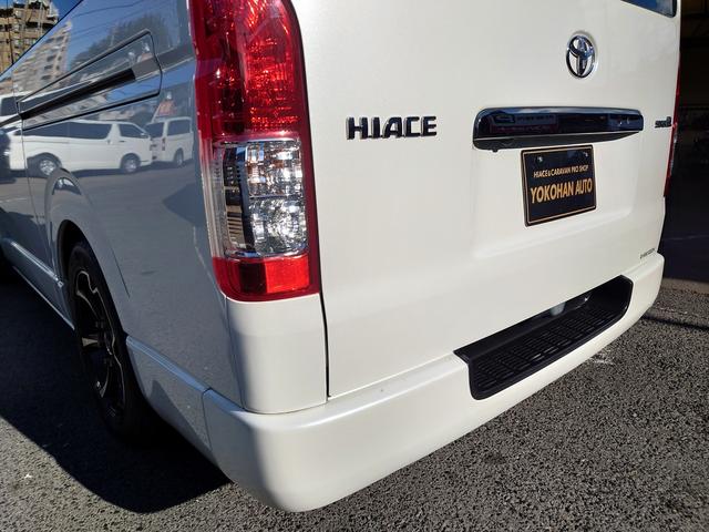 ハイエースバン スーパーGL ダークプライム 4型 3.0ディーゼルターボ 2インチローダウン 17インチアルミホイール フロントエアロ スライド窓 イージークローザー 木目調パネル 純正ナビフルセグTV バックカメラ ETC タイベル交換済み(45枚目)