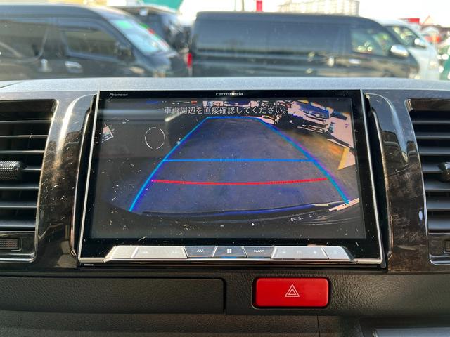 ハイエースバン スーパーＧＬ　ダークプライム　４型　ディーゼル　社外ナビ　ベッドキット　内装カスタム　ソーラーパネル　サブバッテリー　ＦＦヒーター　レカロシート　オーリンズＲサス　足回り改　バッドフェイス　２インチダウン　スライド式セカンドシート（23枚目）