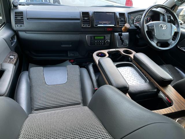 ハイエースバン スーパーＧＬ　ダークプライム　４型　ディーゼル　社外ナビ　ベッドキット　内装カスタム　ソーラーパネル　サブバッテリー　ＦＦヒーター　レカロシート　オーリンズＲサス　足回り改　バッドフェイス　２インチダウン　スライド式セカンドシート（32枚目）