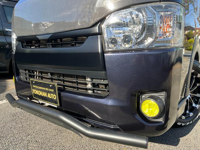 ハイエースバン スーパーＧＬ　ダークプライム　４型　ディーゼル　社外ナビ　ベッドキット　内装カスタム　ソーラーパネル　サブバッテリー　ＦＦヒーター　レカロシート　オーリンズＲサス　足回り改　バッドフェイス　２インチダウン　スライド式セカンドシート（36枚目）