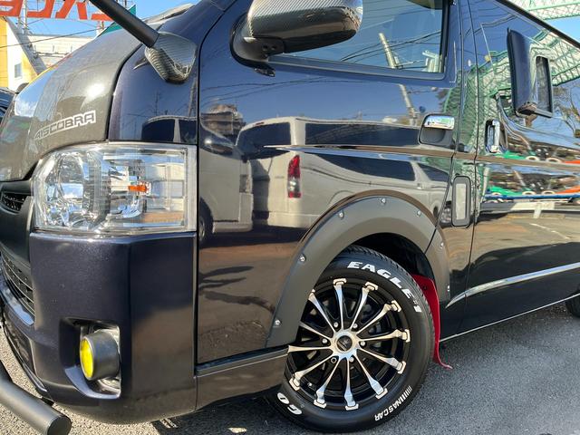 ハイエースバン スーパーＧＬ　ダークプライム　４型　ディーゼル　社外ナビ　ベッドキット　内装カスタム　ソーラーパネル　サブバッテリー　ＦＦヒーター　レカロシート　オーリンズＲサス　足回り改　バッドフェイス　２インチダウン　スライド式セカンドシート（42枚目）