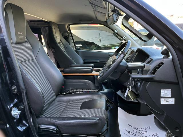 ハイエースバン スーパーＧＬ　ダークプライム　４型　ディーゼル　社外ナビ　ベッドキット　内装カスタム　ソーラーパネル　サブバッテリー　ＦＦヒーター　レカロシート　オーリンズＲサス　足回り改　バッドフェイス　２インチダウン　スライド式セカンドシート（55枚目）