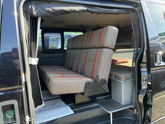 ハイエースバン スーパーＧＬ　ダークプライム　４型　ディーゼル　社外ナビ　ベッドキット　内装カスタム　ソーラーパネル　サブバッテリー　ＦＦヒーター　レカロシート　オーリンズＲサス　足回り改　バッドフェイス　２インチダウン　スライド式セカンドシート（72枚目）
