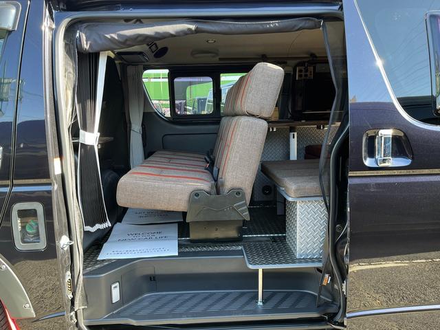 ハイエースバン スーパーＧＬ　ダークプライム　４型　ディーゼル　社外ナビ　ベッドキット　内装カスタム　ソーラーパネル　サブバッテリー　ＦＦヒーター　レカロシート　オーリンズＲサス　足回り改　バッドフェイス　２インチダウン　スライド式セカンドシート（73枚目）
