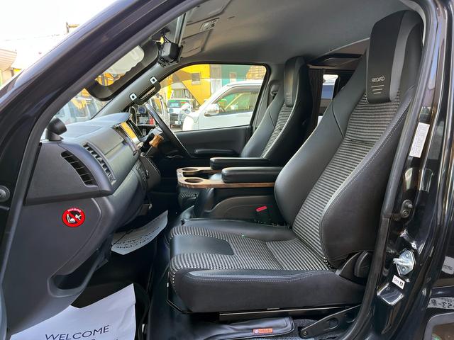 ハイエースバン スーパーＧＬ　ダークプライム　４型　ディーゼル　社外ナビ　ベッドキット　内装カスタム　ソーラーパネル　サブバッテリー　ＦＦヒーター　レカロシート　オーリンズＲサス　足回り改　バッドフェイス　２インチダウン　スライド式セカンドシート（76枚目）