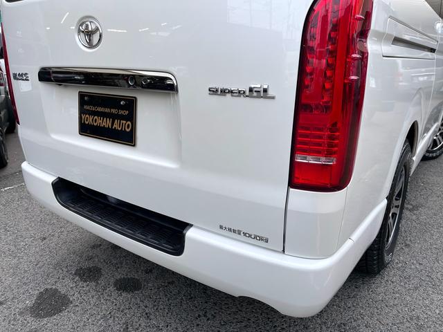 ハイエースバン スーパーＧＬ　ダークプライム　４型　１オーナー禁煙　３．０ディーゼル４ＷＤ　バッドフェイス　ＡＷ１５インチ　エアロ　ウインカーミラー　ベッドキット　ルームキャリア　セカンドテーブル　スライド窓　フィルム　ドラレコ　レーダー探知機（45枚目）