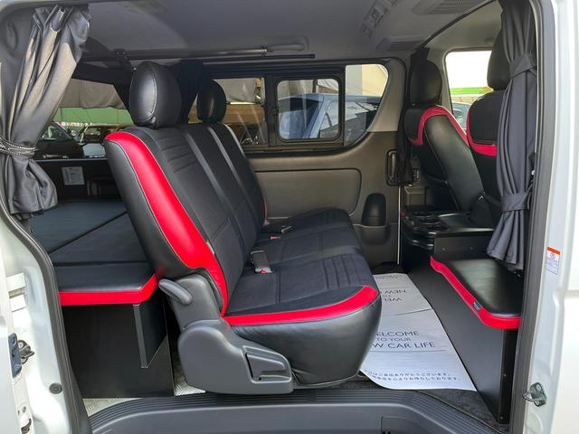 ハイエースバン スーパーＧＬ　ダークプライム　４型　１オーナー禁煙　３．０ディーゼル４ＷＤ　バッドフェイス　ＡＷ１５インチ　エアロ　ウインカーミラー　ベッドキット　ルームキャリア　セカンドテーブル　スライド窓　フィルム　ドラレコ　レーダー探知機（56枚目）