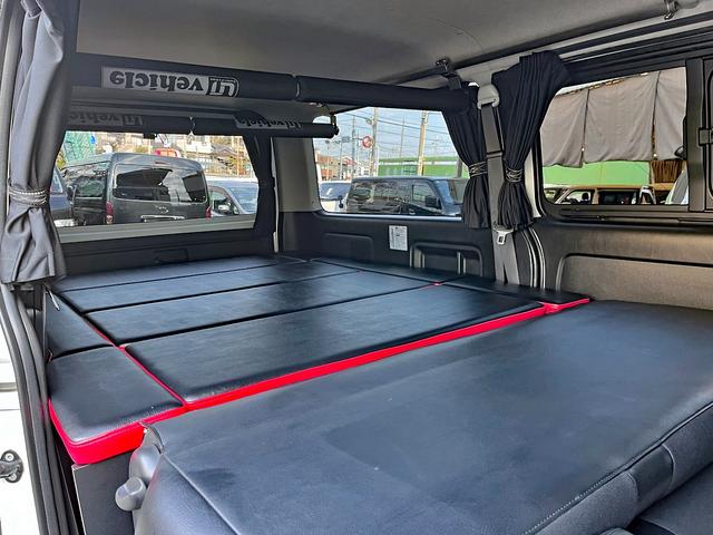 ハイエースバン スーパーＧＬ　ダークプライム　４型　１オーナー禁煙　３．０ディーゼル４ＷＤ　バッドフェイス　ＡＷ１５インチ　エアロ　ウインカーミラー　ベッドキット　ルームキャリア　セカンドテーブル　スライド窓　フィルム　ドラレコ　レーダー探知機（60枚目）