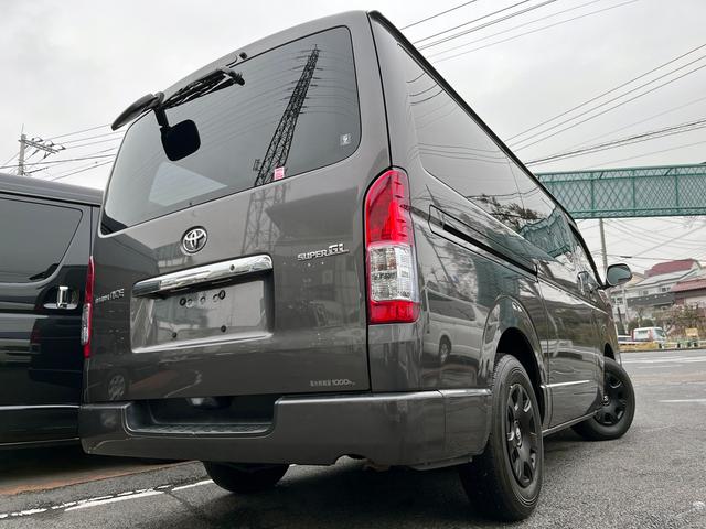 レジアスエースバン ロングスーパーＧＬ　４型　純正ナビ　バックカメラ　ＥＴＣ　ＬＥＤライト　Ｆエアロ　ブラックグリル　ウインカーミラー　イージークローザー　スライド窓　プライバシーガラス　ドラレコ付きデジタルルームミラー（5枚目）