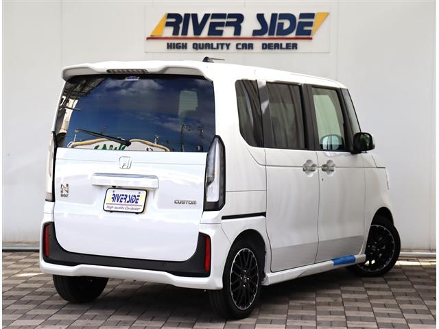 N-BOXカスタム ターボコーディネートスタイル 禁煙車 記録簿 登録/届出済未使用車 アイドリングストップ 衝突被害軽減システム バックカメラ ナビ&TV DVD再生 両側電動スライド(3枚目)