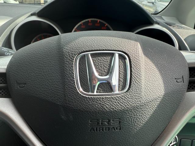 フィット G 走行13473km・車検9年2月28日・Fパッケージ・ストラーダHDDナビ(17枚目)