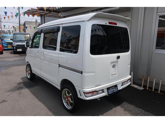 クルーズターボSAIII ハイルーフ リフトアップカスタム車 HDDナビ&TV 前後ショートバンパー フロントスキッドプレート リフトアップサス アドバンレーシング15インチ鍛造アルミ 純正OPルーフスポイラー LEDヘッドライト リアソファーキット(17枚目)