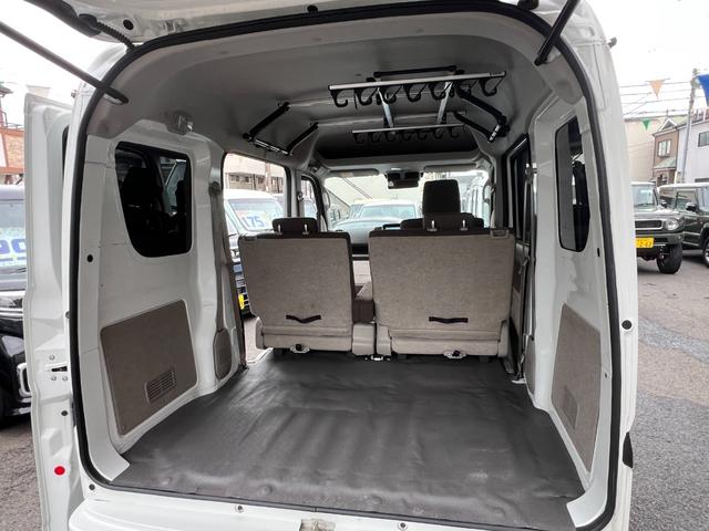 ＮＶ１００クリッパーバン ＧＸターボ　ハイルーフ　・社外ナビ　Ｂカメラ　１．５インチＵＰサス　ルーフラック　ロッドホルダー　リア５面スモークフィルム　社外１５インチアルミ　ＣＤ　ＤＶＤ　ＵＳＢ　ワンセグＴＶ　ＢＴ接続　スキッドプレート　ラバーマット（11枚目）