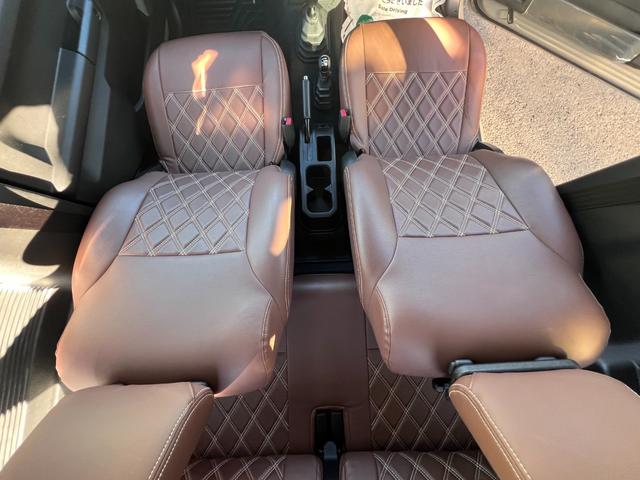 ジムニー ＸＣターボ　４ＷＤ　５速ＭＴ　・ＪＡＯＳリフトＵＰセット　鍛造アルミ　ケンウッド９型ナビ　Ｂカメラ　フルセグＴＶ　ＢＴ接続　ＥＴＣ　茶革調シートカバー　社外前後バンパー＆プレート＆マフラー＆テールランプ　ラノーズＥＣＵハイオク仕様（7枚目）