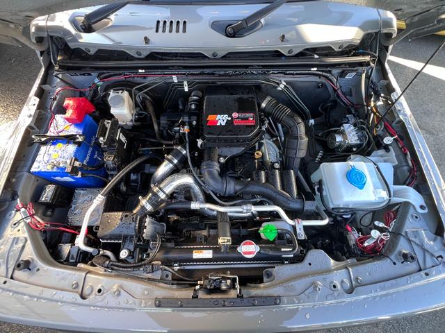 ジムニー ＸＣターボ　４ＷＤ　５速ＭＴ　・ＪＡＯＳリフトＵＰセット　鍛造アルミ　ケンウッド９型ナビ　Ｂカメラ　フルセグＴＶ　ＢＴ接続　ＥＴＣ　茶革調シートカバー　社外前後バンパー＆プレート＆マフラー＆テールランプ　ラノーズＥＣＵハイオク仕様（38枚目）