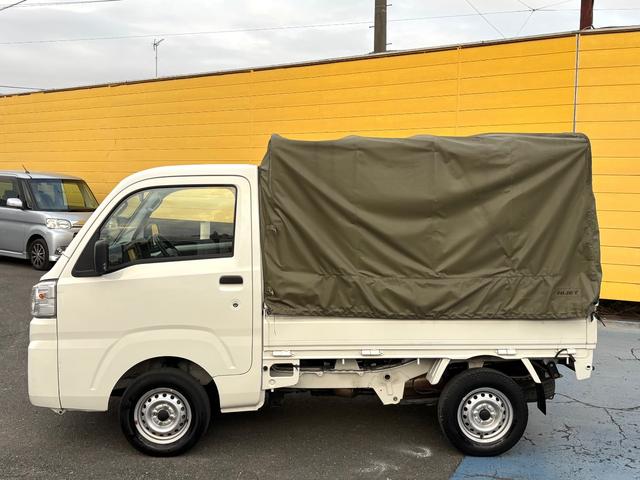 ハイゼットトラック スタンダード 1オーナー 禁煙車 幌付き エアコン パワーステアリング 社外ナビTV CD FM&AMラジオ ETC アクセサリー電源 運転席エアバッグ ABS ヘッドライトレベライザー 取扱説明書 保証書 記録簿(4枚目)