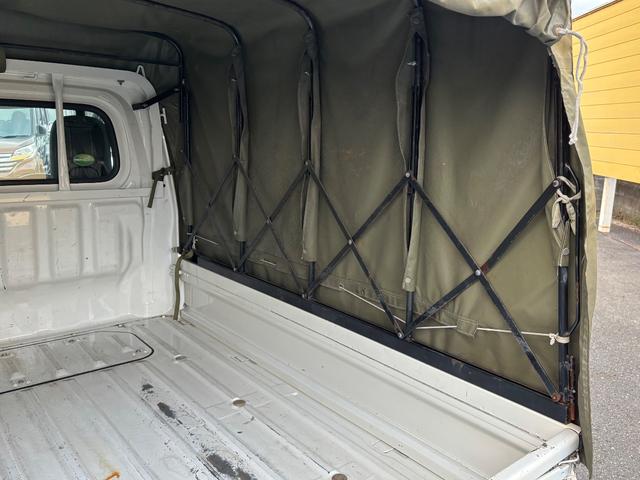 ハイゼットトラック スタンダード 1オーナー 禁煙車 幌付き エアコン パワーステアリング 社外ナビTV CD FM&AMラジオ ETC アクセサリー電源 運転席エアバッグ ABS ヘッドライトレベライザー 取扱説明書 保証書 記録簿(12枚目)