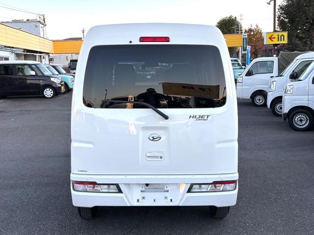 ハイゼットカーゴ クルーズＳＡＩＩＩ　衝突被害軽減ブレーキ　車線逸脱警報　社外ナビ　バックカメラ　ＣＤ　ＡＵＸ　Ｂｌｕｅｔｏｏｔｈ　ドラレコ　ＥＴＣ　オートハイビーム　電動格納ドアミラー　キーレス　アイドリングストップ　禁煙車　記録簿（7枚目）