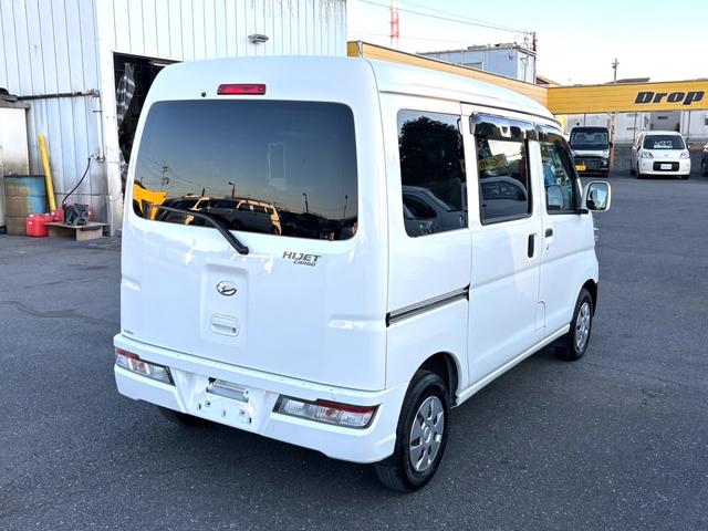 ハイゼットカーゴ クルーズＳＡＩＩＩ　衝突被害軽減ブレーキ　車線逸脱警報　社外ナビ　バックカメラ　ＣＤ　ＡＵＸ　Ｂｌｕｅｔｏｏｔｈ　ドラレコ　ＥＴＣ　オートハイビーム　電動格納ドアミラー　キーレス　アイドリングストップ　禁煙車　記録簿（8枚目）