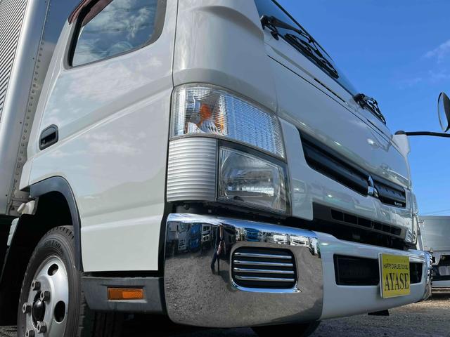 キャンター 格納ゲート付ワイドロング２ｔ積アルミバン　５速ＭＴ　ワイドロング２ｔ積アルミバン　５速ＭＴ　助手席側サイド扉付　リヤ観音開き　荷台内寸長４５０幅２０８高２０７ｃｍ　荷室床面鉄板敷き　ラッシングレール２段　パブコ製格納パワーゲート付　昇降能力１０００キロ（26枚目）