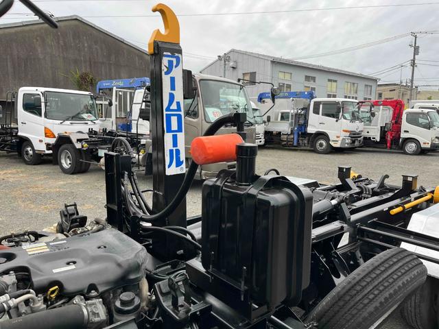 エルフトラック 3t積アームロール新明和Wシリンダー スムーサーAT 3t積み脱着装置付コンテナ専用車 車検R8年10月19日 スムーサーAT 新明和製アームロール CCA23ー11 ツインホイスト 車両総重量6065キロ(35枚目)