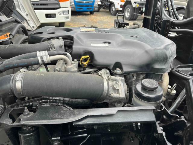 エルフトラック 3t積アームロール新明和Wシリンダー スムーサーAT 3t積み脱着装置付コンテナ専用車 車検R8年10月19日 スムーサーAT 新明和製アームロール CCA23ー11 ツインホイスト 車両総重量6065キロ(45枚目)