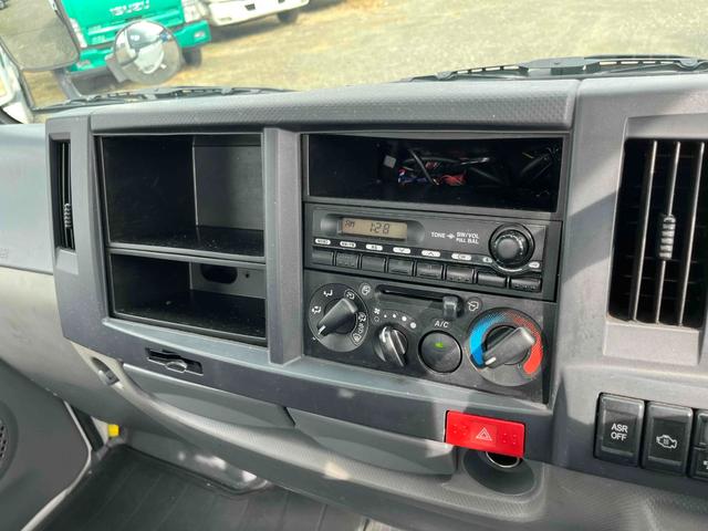 エルフトラック 2t積アームロール 新明和Wシリンダー 6速MT 2t積み脱着装置付コンテナ専用車 3Lディーゼルターボ 6速MT 車検R8年7月13日 バックカメラ付 新明和製アームロール CCA23ー11 ツインホイスト 車両総重量4855キロ 5t限定免許対応(40枚目)