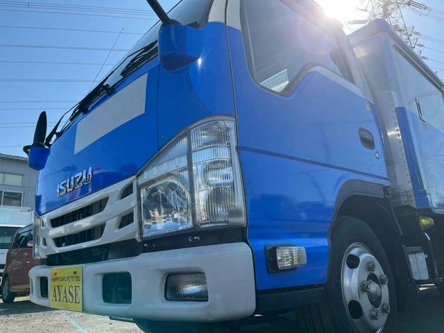 エルフトラック セミロング2t積アルミバン 全高205cm スムーサーAT 2t積アルミバン セミロング車 スムーサーAT 全高205cm クリーニング屋使用歴 リヤ観音開き 助手席側サイドドア付 荷台内寸長348幅179高111cm 車両総重量4765キロ 5t限定免許対応(25枚目)