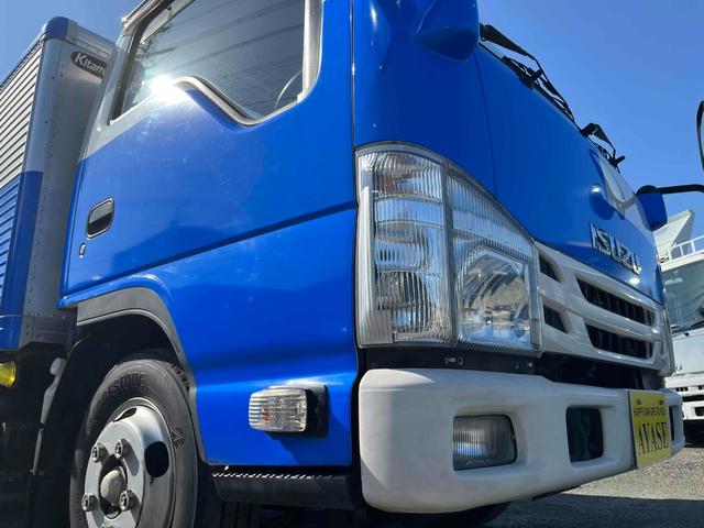 エルフトラック セミロング2t積アルミバン 全高205cm スムーサーAT 2t積アルミバン セミロング車 スムーサーAT 全高205cm クリーニング屋使用歴 リヤ観音開き 助手席側サイドドア付 荷台内寸長348幅179高111cm 車両総重量4765キロ 5t限定免許対応(26枚目)