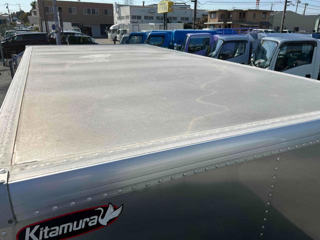 エルフトラック セミロング2t積アルミバン 全高205cm スムーサーAT 2t積アルミバン セミロング車 スムーサーAT 全高205cm クリーニング屋使用歴 リヤ観音開き 助手席側サイドドア付 荷台内寸長348幅179高111cm 車両総重量4765キロ 5t限定免許対応(37枚目)