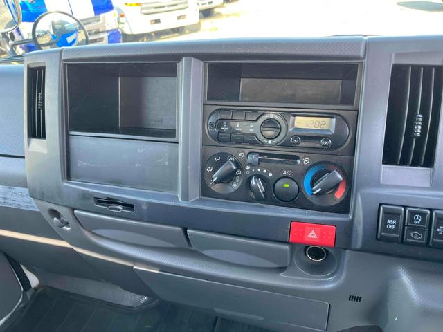 エルフトラック セミロング2t積アルミバン 全高205cm スムーサーAT 2t積アルミバン セミロング車 スムーサーAT 全高205cm クリーニング屋使用歴 リヤ観音開き 助手席側サイドドア付 荷台内寸長348幅179高111cm 車両総重量4765キロ 5t限定免許対応(39枚目)