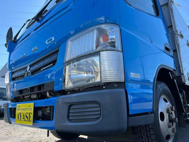 キャンター 垂直ゲート付２ｔ積み平アルミブロック　ガス屋仕様５方開アオリ　２ｔ積アルミブロック平ボディー　５速ＭＴ　上下前後分割５方開アオリ　中間支柱脱着可　荷台内寸長３１５幅１６８高１１１ｃｍ　新明和製垂直パワーゲート付　　タイヤ山８分　車両総重量５１１５キロ（25枚目）