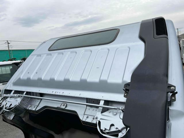 キャンター ２．６ｔ積プレス式パッカー車　新明和７．４立米　２．６ｔ積プレス式パッカー車　５速ＭＴ　ＥＴＣ　バックカメラ付　新明和製Ｇ－ＰＸ　タンク床面ステンレス　容積７．４立米　連続スイッチ　ステンレス汚水タンク　コンテナ反転装置付　車両総重量７９８５ｋｇ（47枚目）